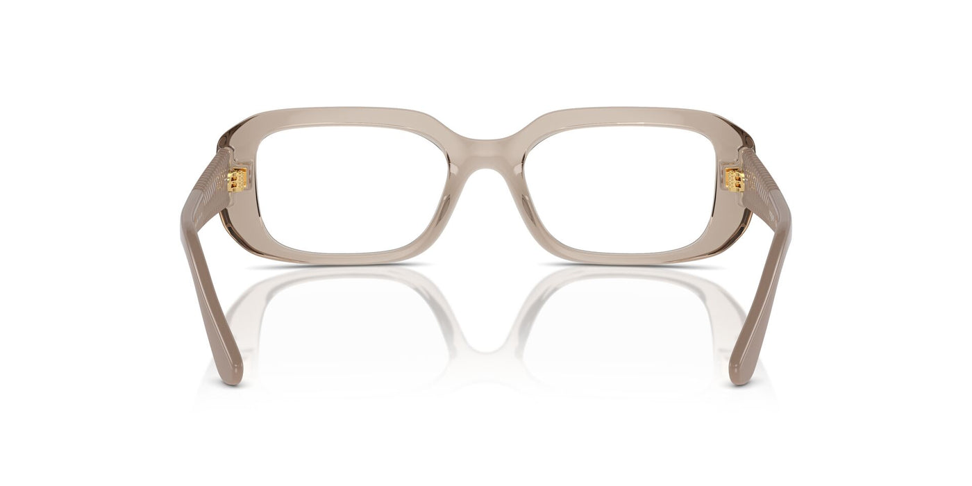 Vogue Eyewear VO5568 Transparent Caramel #colour_transparent-caramel