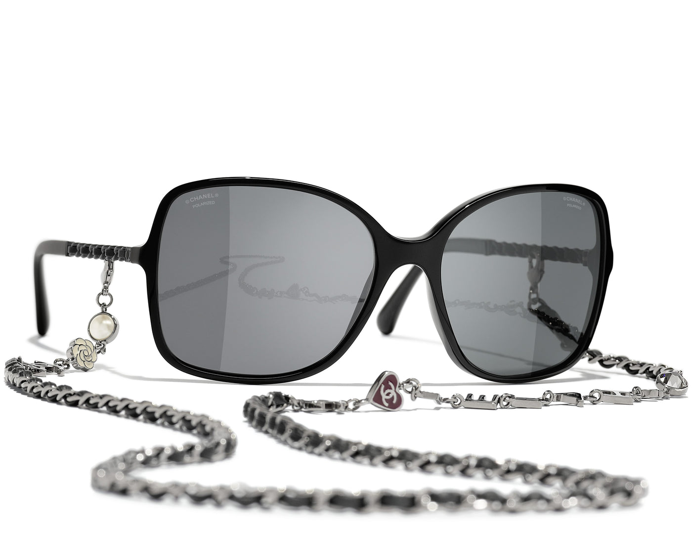 Cat eye Coco Chanel style sunglasses with black armor and purple